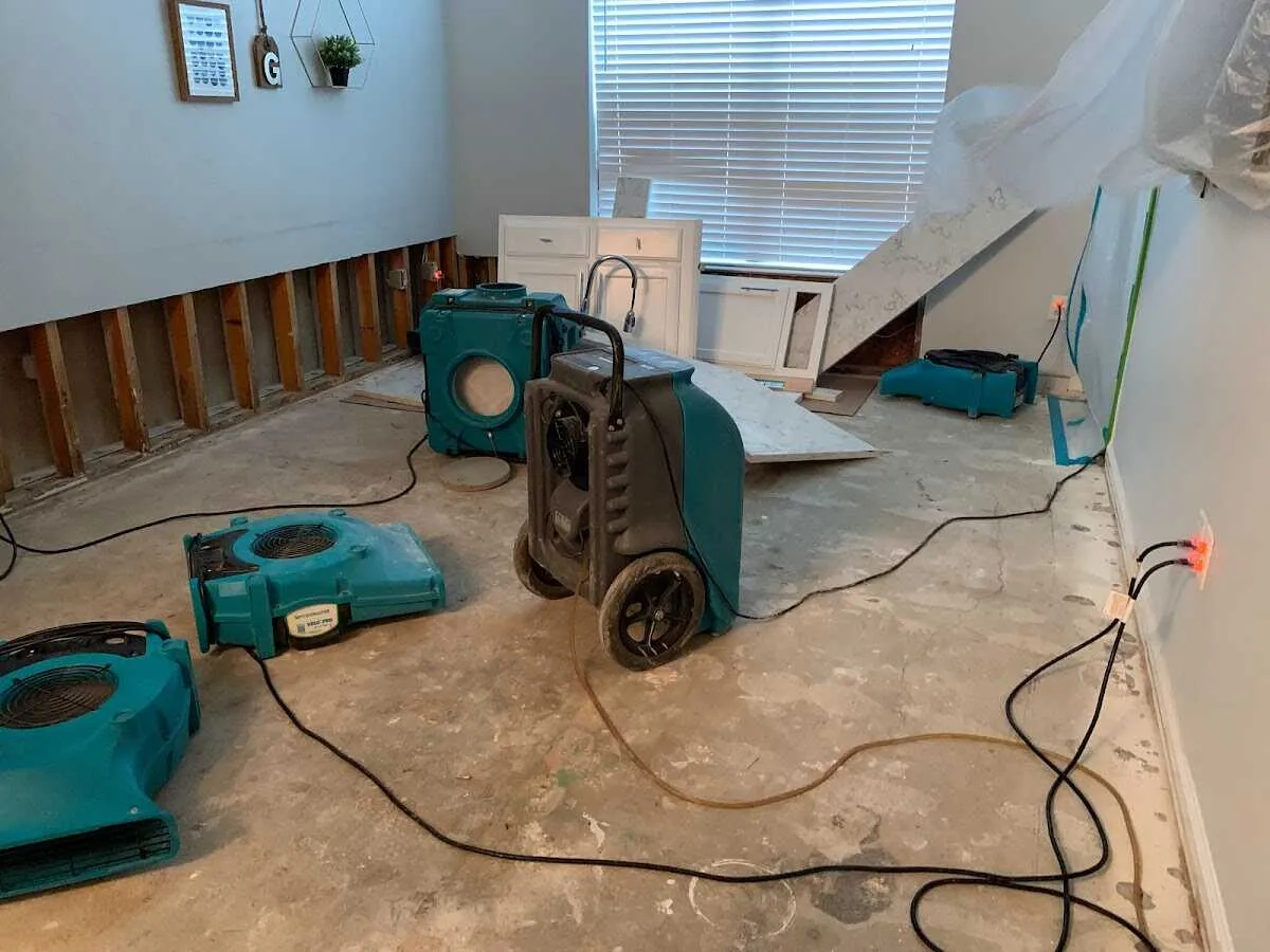 Dehumidifier in flood-cut room for Water Damage Restoration in Huntersville